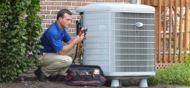 Technician working on AC System